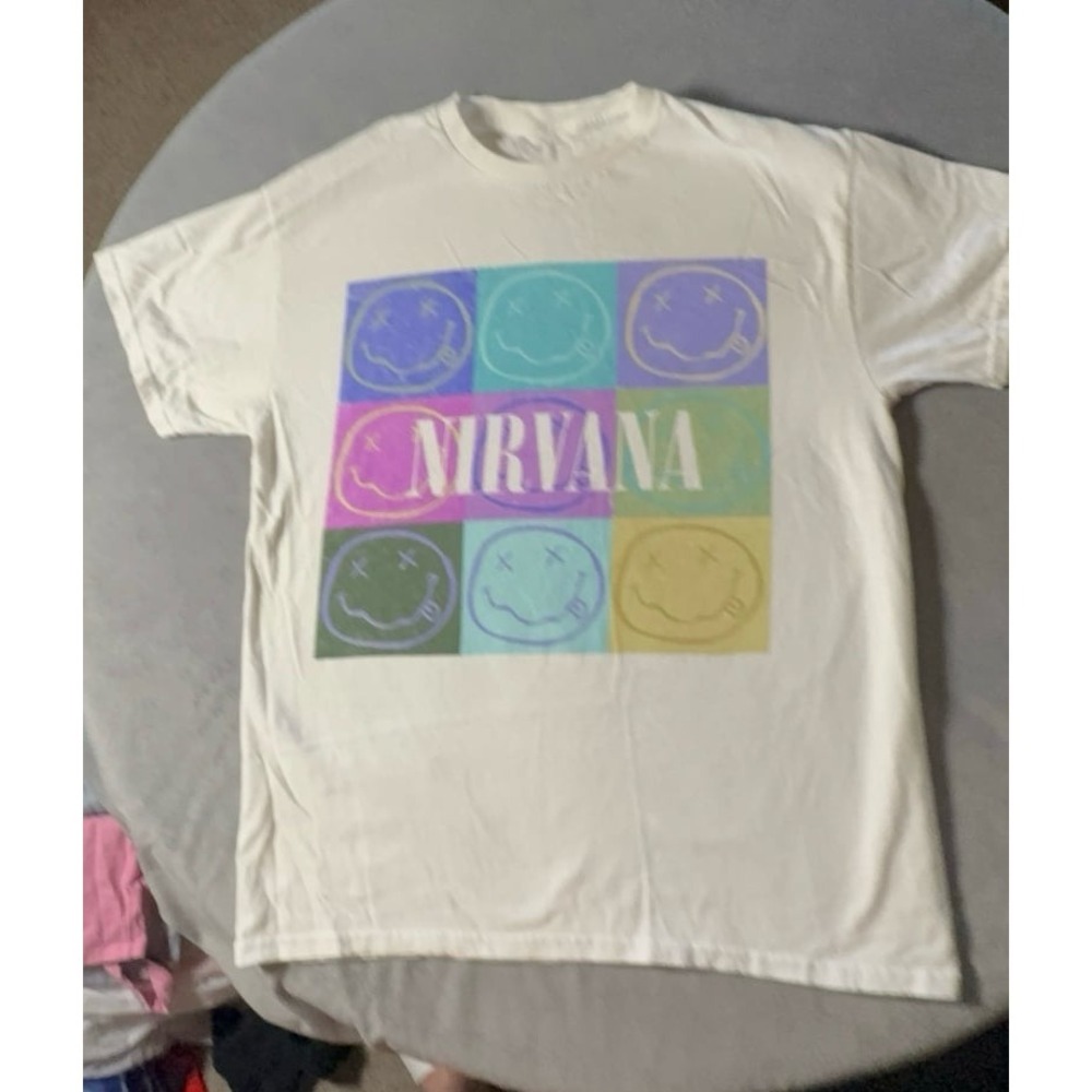 Adult size medium NIRVANA white with blues/purples/yellow Tshirt.